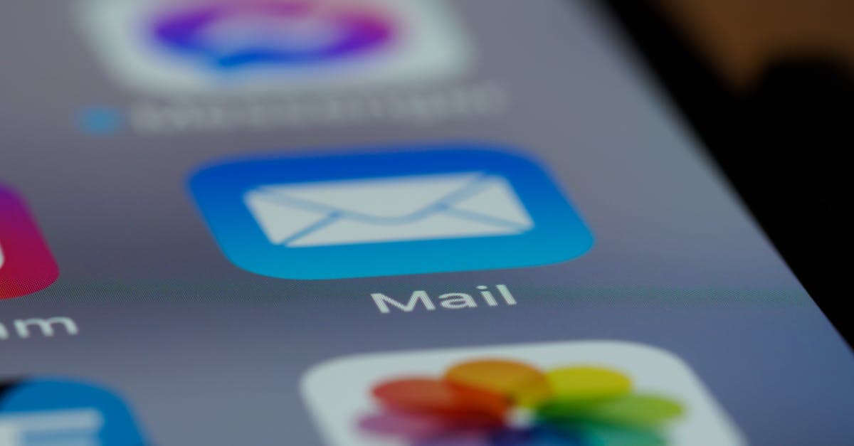 Mobile phone showing an SMS support conversation alongside a helpdesk dashboard