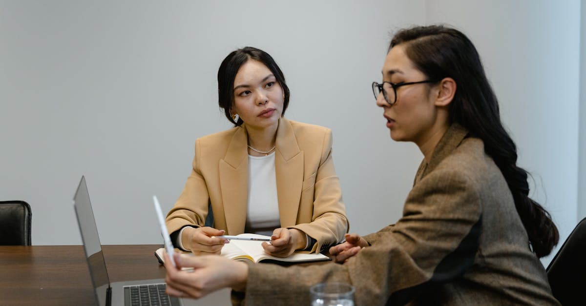 Young apprentice working alongside an experienced professional