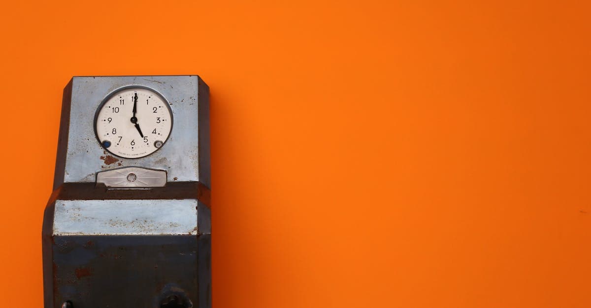 Clock showing break time with a coffee cup on a desk