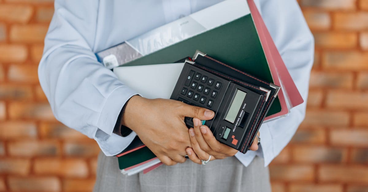 Construction worker reviewing CIS deduction statement
