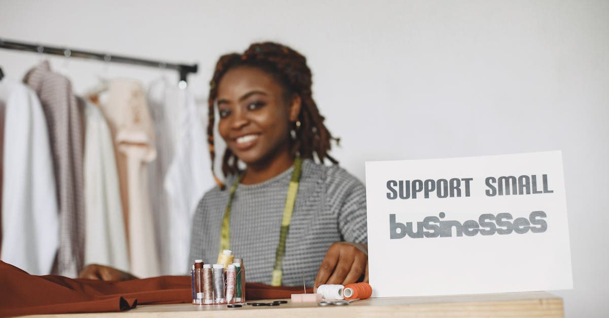 Business owner handing a folder to a team member in a bright office