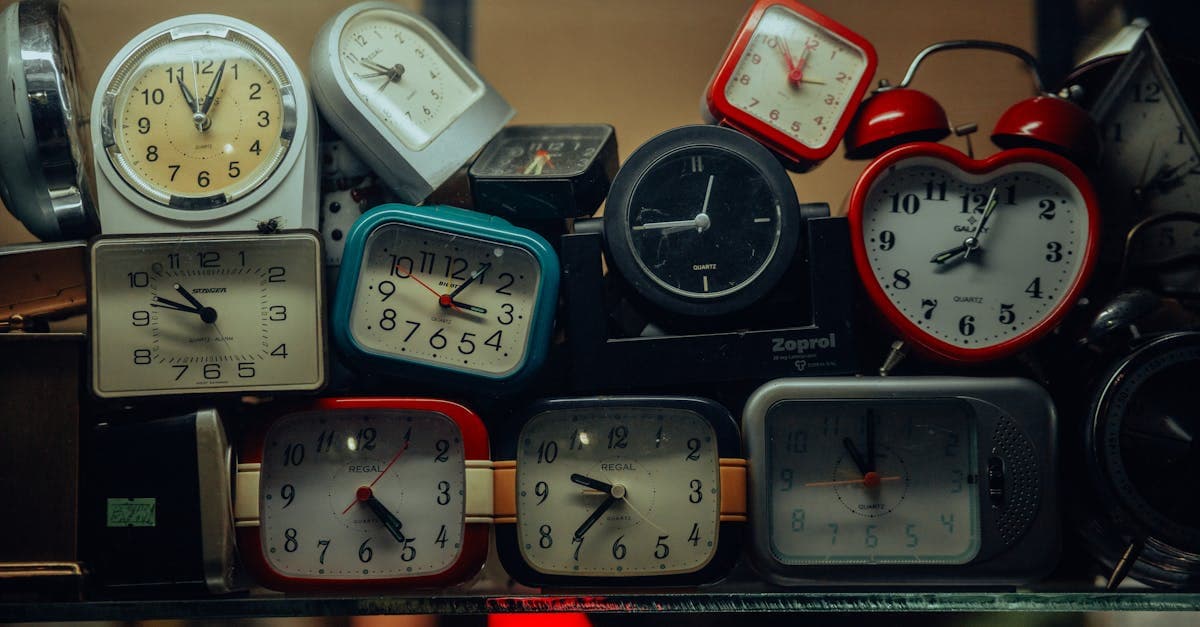 Manager and employee reviewing a timesheet together at a desk
