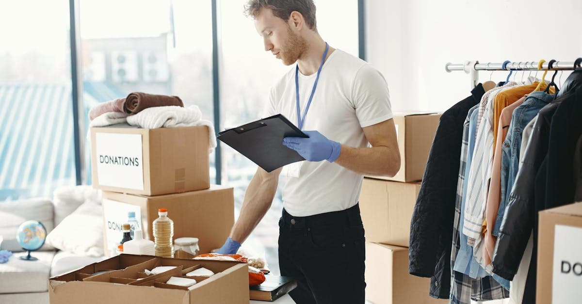 Inventory clerk reviewing a daily schedule of property inspection bookings on a tablet