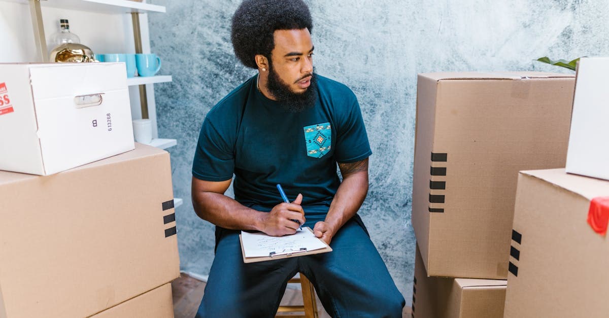 Inventory clerk planning business growth strategy at a desk with a laptop and calendar