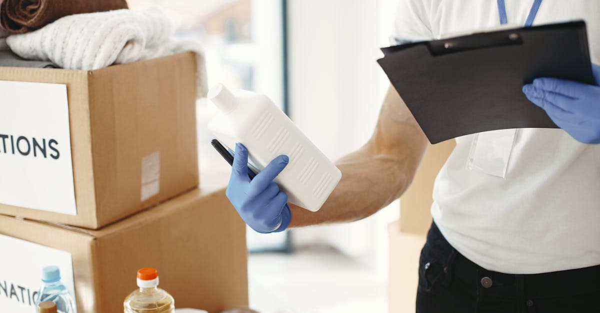 Inventory clerk documenting a communal kitchen in a house in multiple occupation