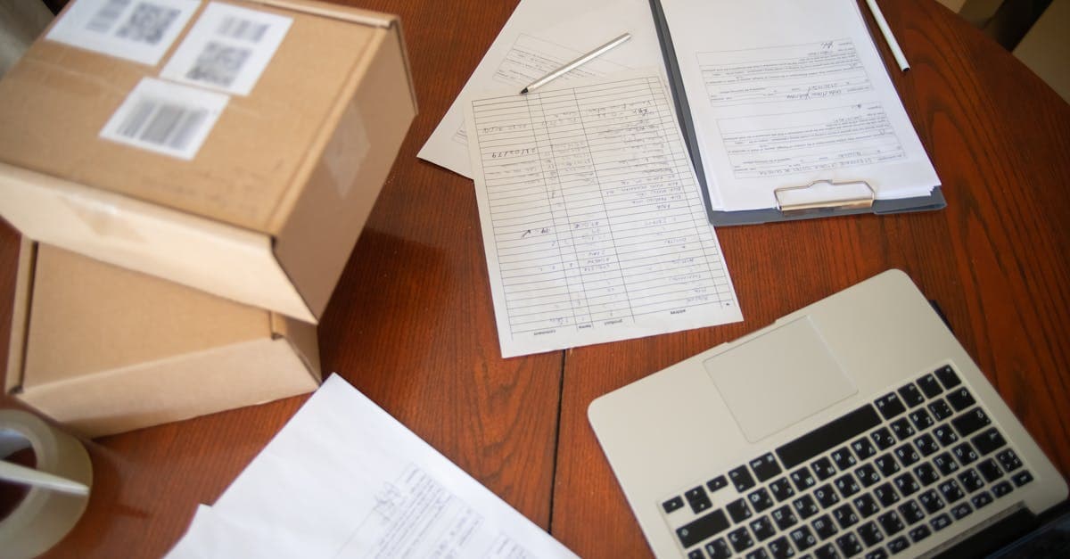 Three different property report documents compared side by side on a desk