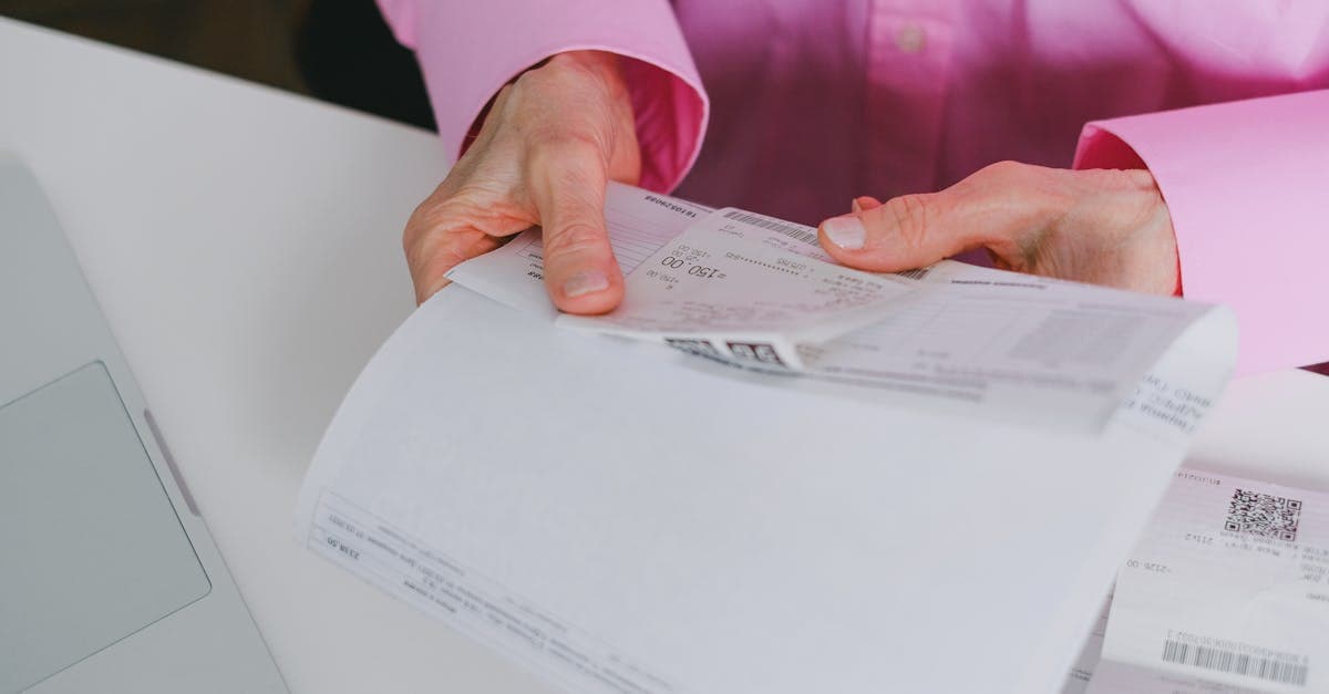A landlord reviewing rental property financial records on a tablet