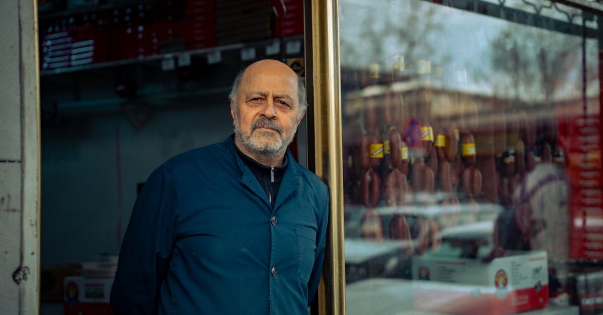 Solo business owner working at a clean, organised desk with a planner