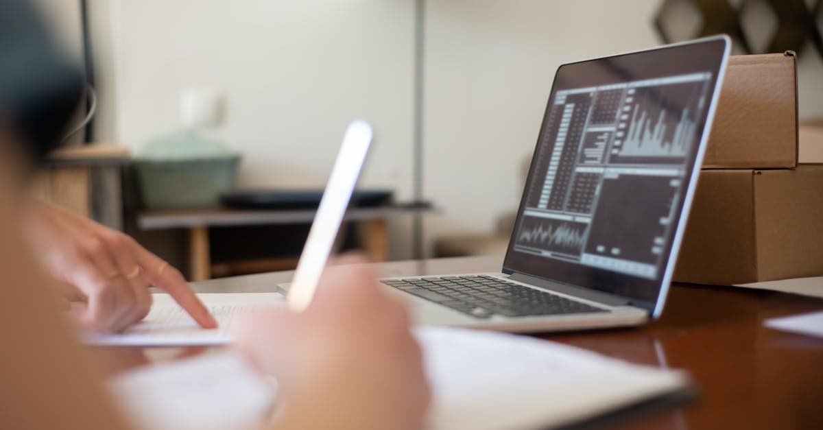 Car dashboard with mileage log open on a phone