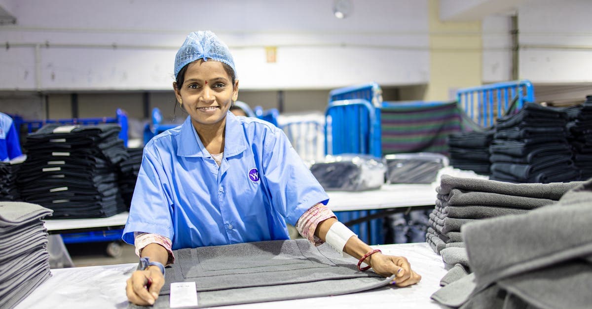 Nursery classroom with small tables and chairs and colourful learning materials