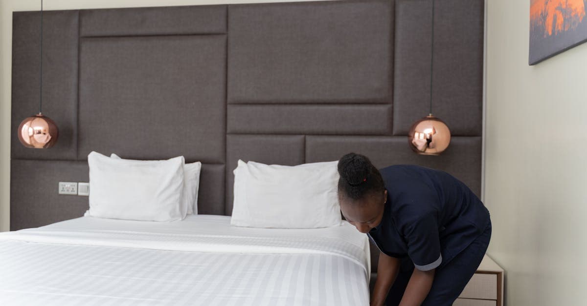 Inventory clerk photographing a room with proper lighting and angles for an inventory report