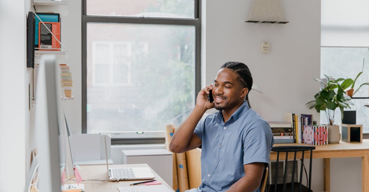 Business owner reviewing growth charts and plans at a desk