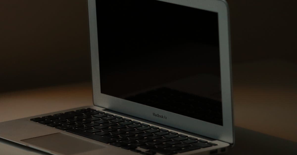 Estate agent comparing CRM software options on screen