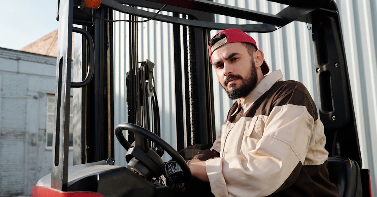 Weekly shift schedule displayed on a whiteboard with coloured time blocks