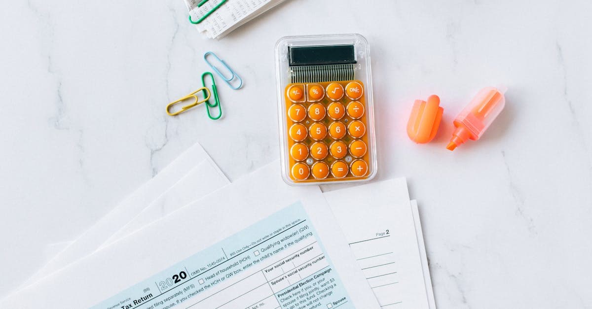 Business owner reviewing corporation tax calculations