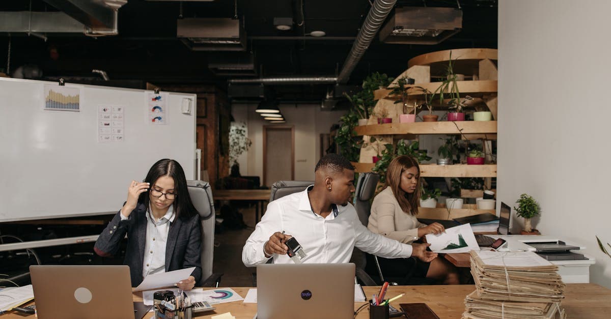 Employment contract document on a desk with a pen