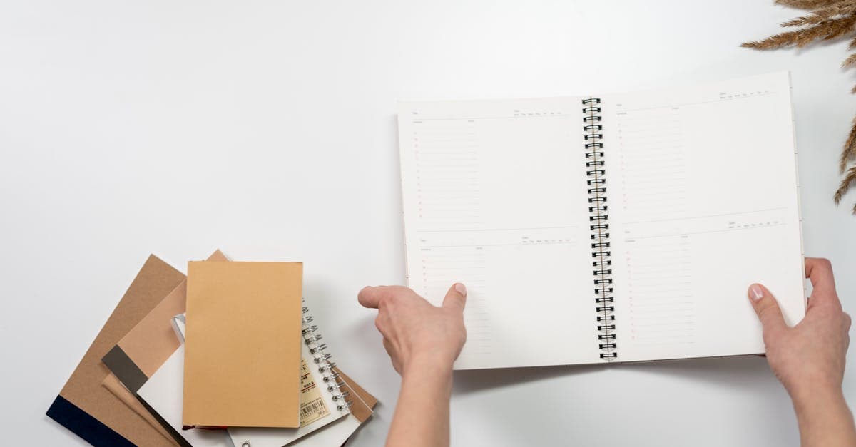 Freelancer working on a laptop in a home office with a coffee cup nearby