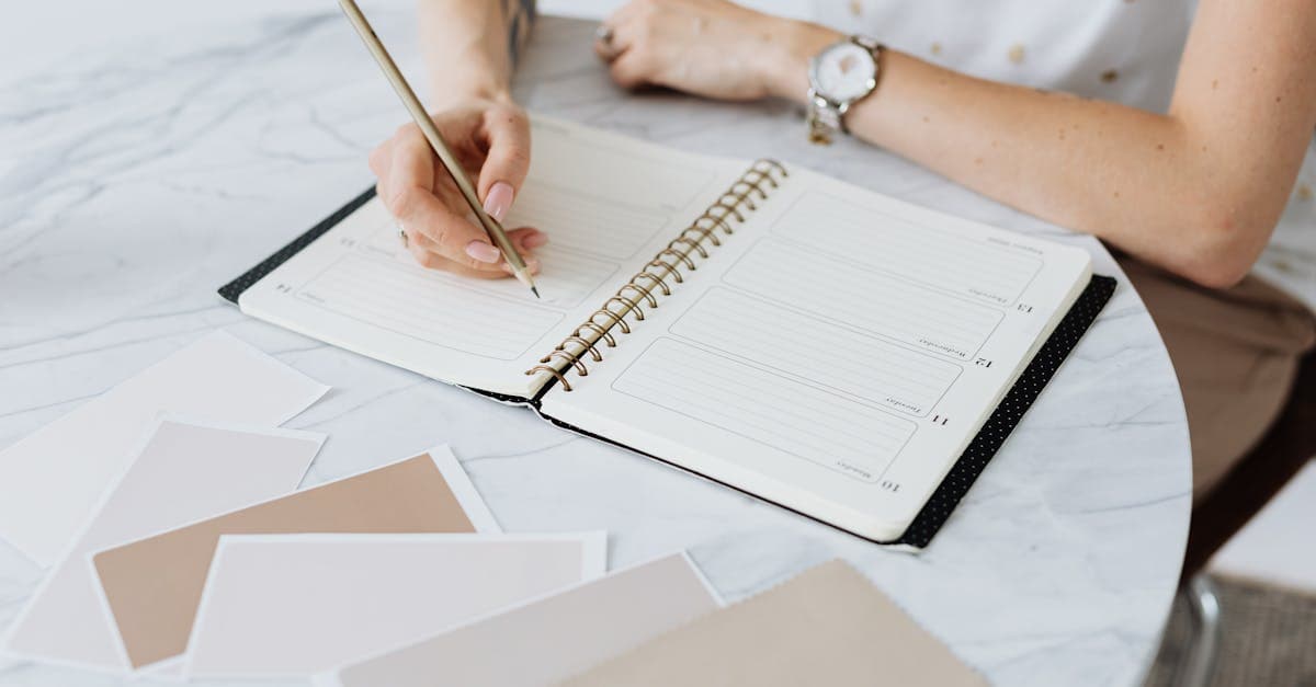 Documents being handed between two business professionals at a desk