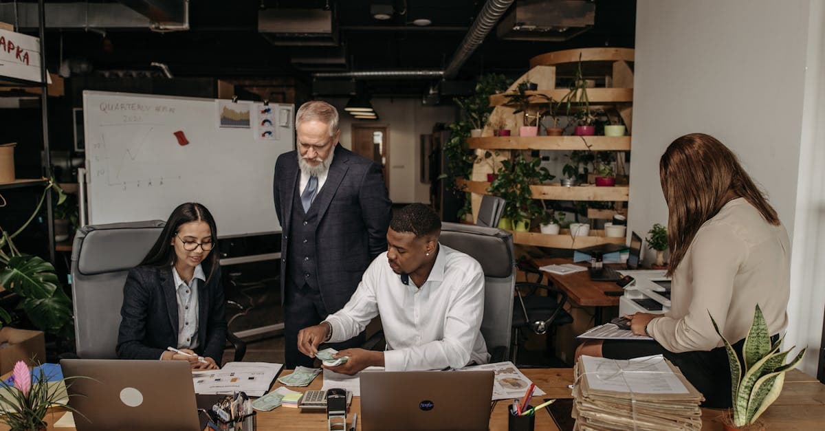 Employer reviewing workplace pension scheme documentation