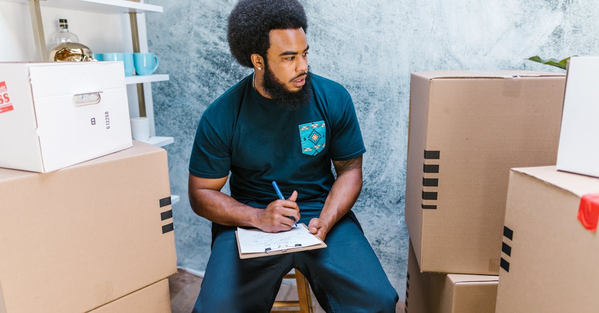 Inventory clerk planning business growth strategy at a desk with a laptop and calendar