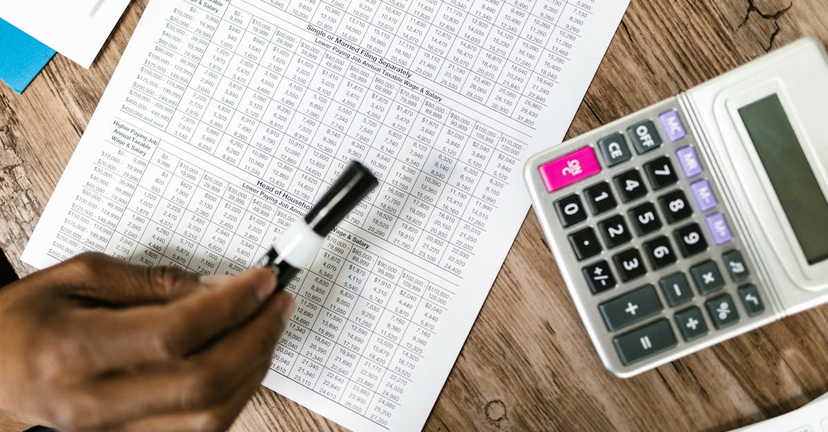Business owner reviewing redundancy planning documents